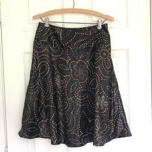 Star City Black Skater Skirt with Gold Dot Floral Pattern